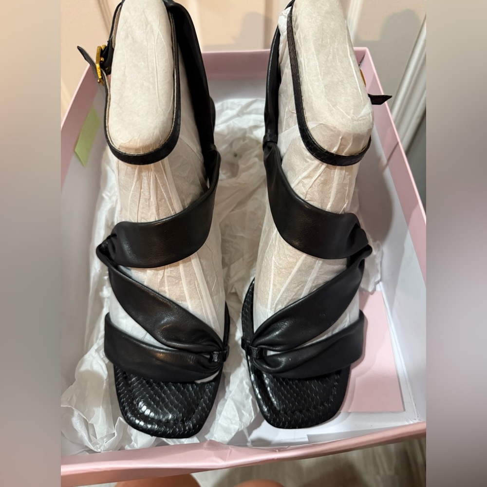 Beautiful dressy heel sandals heel is about 2 1/2-3 inches